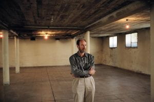 Photo of Juan Mandelbaum in the empty ESME basement.