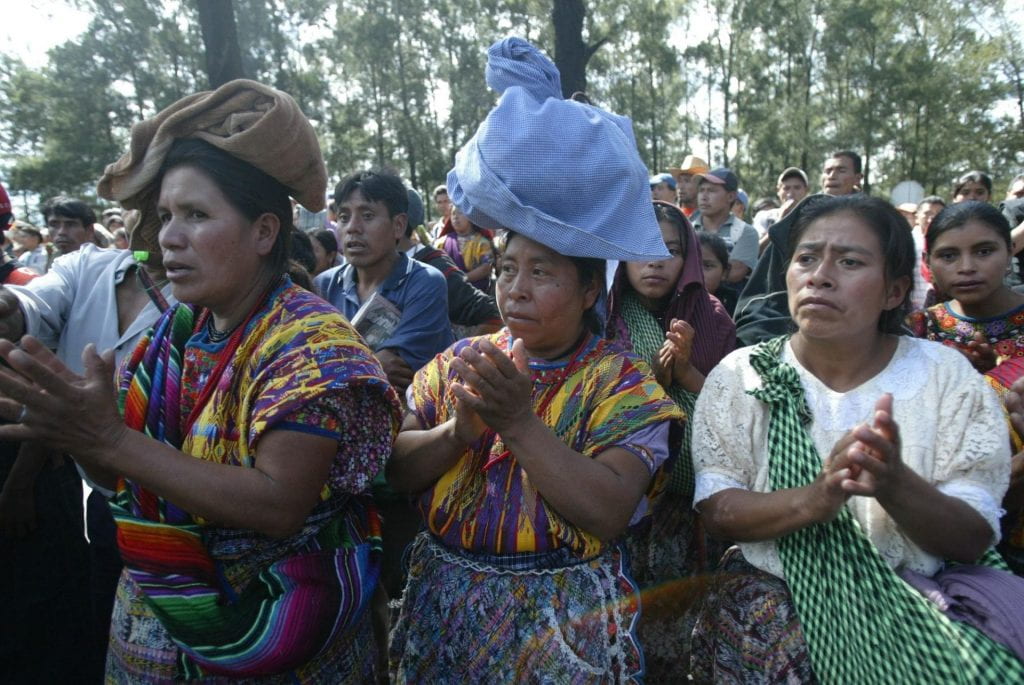 Indigenous women protesting in the streets.