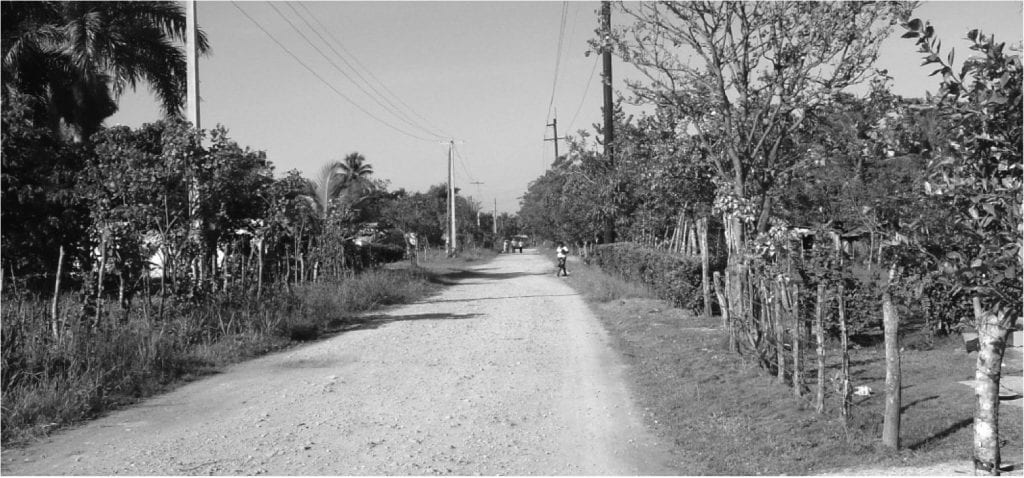 A photo of the street that ran in front of Molly Coeling’s house in el Peje de Guerra in the Dominican Republic., where she was a Peace Corps volunteer in the early 1960s
